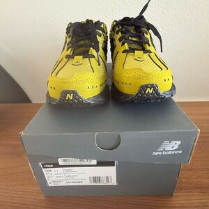 New Balance Yellow and Black Athletic Shoes